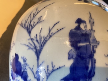 A Chinese blue and white jar and cover with figures in a landscape, Transitional period